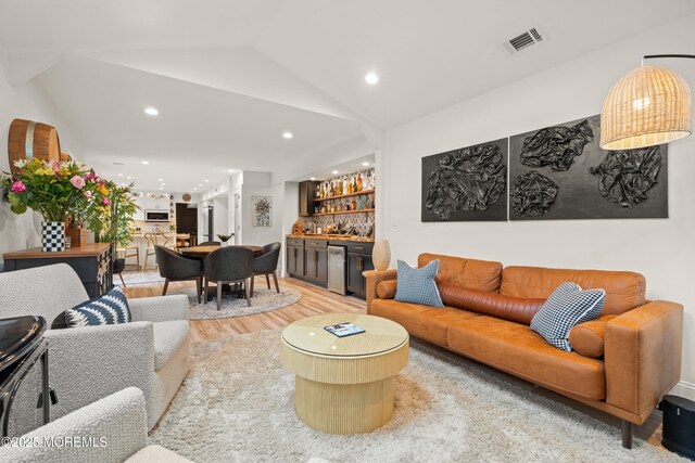 7 Carlisle Ct, Hazlet, NJ 07730 - living area featuring bar area, light wood-style floors, recessed lighting, and lofted ceiling