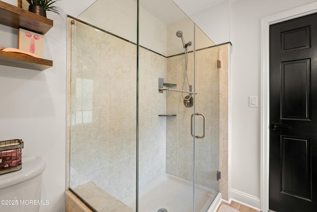 7 Carlisle Ct, Hazlet, NJ 07730 - bathroom with a stall shower, toilet, and baseboards