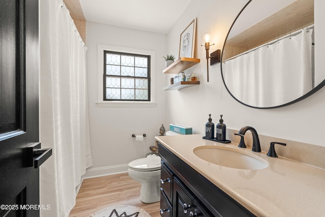 7 Carlisle Ct, Hazlet, NJ 07730 - bathroom with wood finished floors, vanity, toilet, baseboards, and a shower with curtain