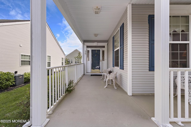 26 Masters Ct, Little Egg Harbor, NJ 08087 - balcony featuring a porch and central AC