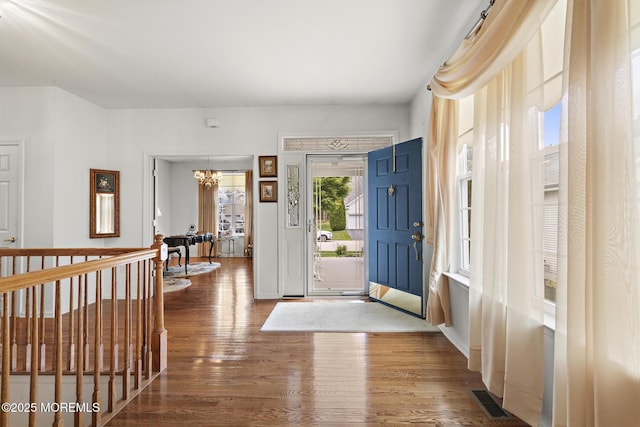 26 Masters Ct, Little Egg Harbor, NJ 08087 - foyer with wood finished floors and a chandelier