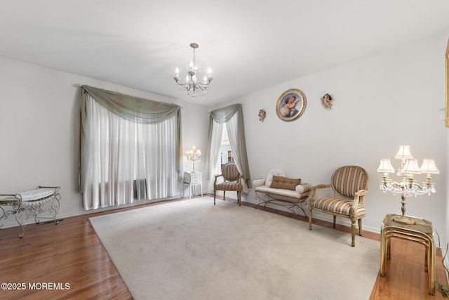 26 Masters Ct, Little Egg Harbor, NJ 08087 - sitting room featuring a chandelier, wood finished floors, and baseboards