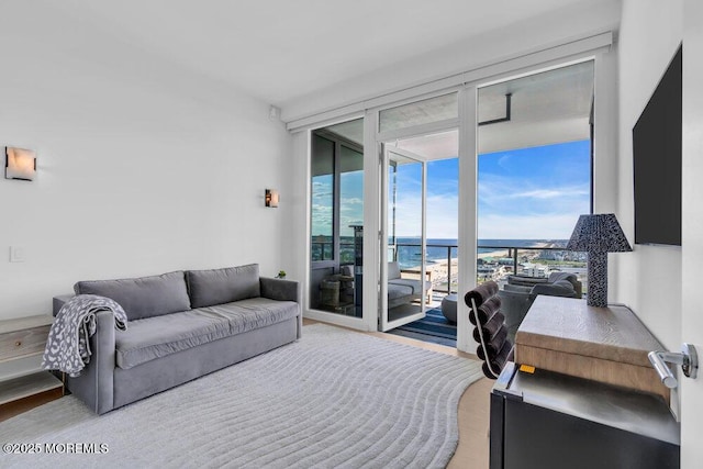 1101 Ocean Ave Unit 1403, Asbury Park, NJ 07712 - living area with floor to ceiling windows, plenty of natural light, and wood finished floors