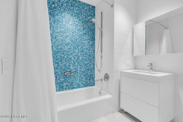 1101 Ocean Ave Unit 1403, Asbury Park, NJ 07712 - bathroom featuring shower / bath combo, vanity, and tile walls