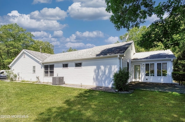 2299 Kira Ct, Toms River, NJ 08755 - back of house with a lawn, central AC, and roof with shingles