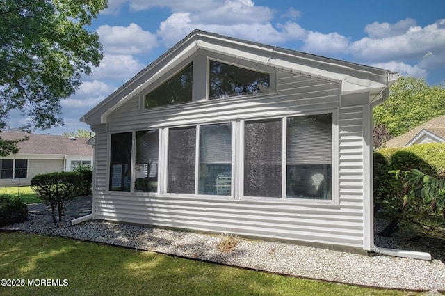 2299 Kira Ct, Toms River, NJ 08755 - view of side of home featuring a sunroom