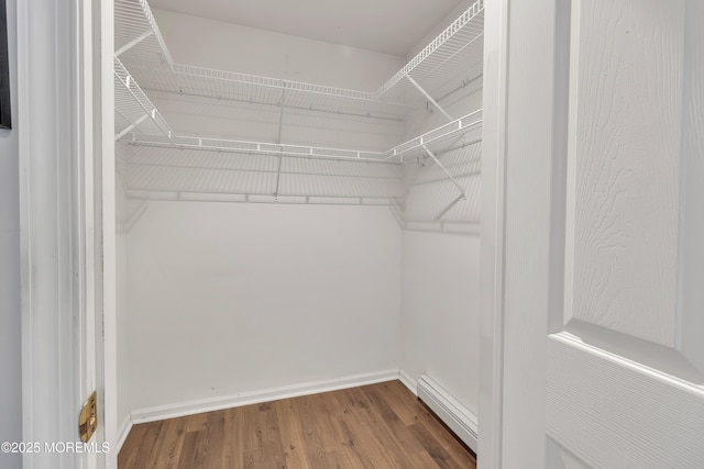 2299 Kira Ct, Toms River, NJ 08755 - spacious closet featuring baseboard heating and wood finished floors