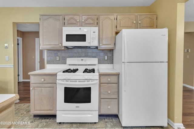 2299 Kira Ct, Toms River, NJ 08755 - kitchen featuring white appliances, light countertops, light brown cabinets, and backsplash