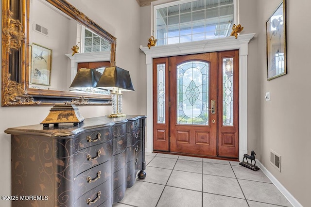 1 Lattimore Ct, Freehold, NJ 07728 - foyer featuring tile patterned flooring, plenty of natural light, and baseboards