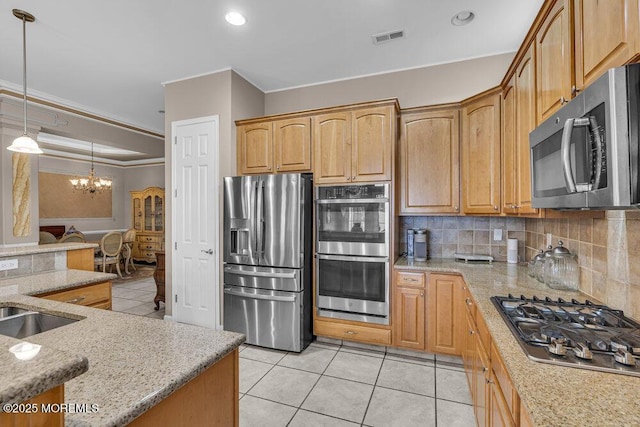 1 Lattimore Ct, Freehold, NJ 07728 - kitchen featuring appliances with stainless steel finishes, crown molding, light tile patterned flooring, tasteful backsplash, and a chandelier