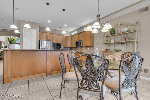 1 Lattimore Ct, Freehold, NJ 07728 - dining area with light tile patterned floors, ornamental molding, and baseboards