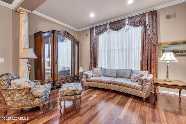 1 Lattimore Ct, Freehold, NJ 07728 - living room with hardwood / wood-style flooring, ornate columns, crown molding, and recessed lighting