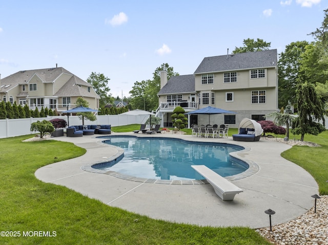 16 Wildflower Ct, Manalapan, NJ 07726 - view of swimming pool with a patio, an outdoor living space, a diving board, and outdoor dining space