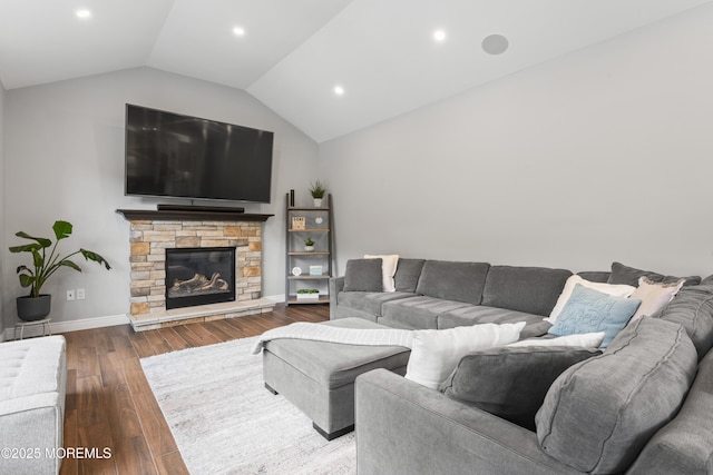 16 Wildflower Ct, Manalapan, NJ 07726 - living room featuring vaulted ceiling, wood finished floors, baseboards, recessed lighting, and a stone fireplace