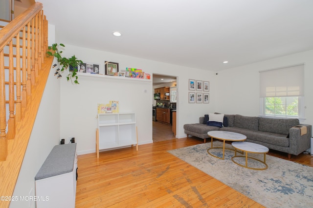 209 Woodcrest Rd, Oakhurst, NJ 07755 - living room featuring stairway, light wood-style floors, and recessed lighting