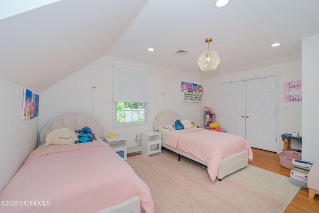 209 Woodcrest Rd, Oakhurst, NJ 07755 - bedroom with light wood-style floors, a closet, recessed lighting, and vaulted ceiling