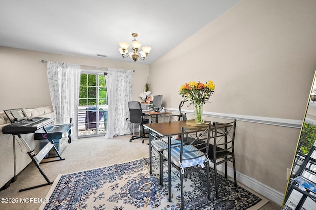 carpeted home office with a chandelier