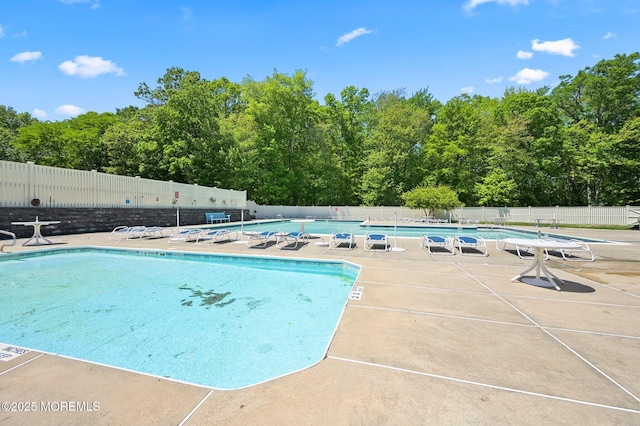 community pool featuring a patio