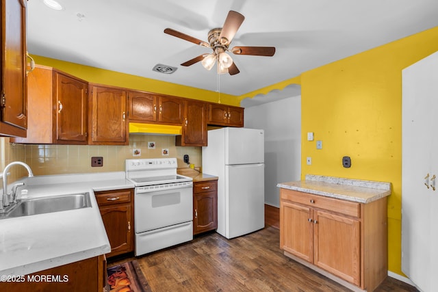 11 Lexington Dr Unit A, Whiting, NJ 08759 - kitchen with white appliances, a sink, under cabinet range hood, ceiling fan, and dark wood finished floors