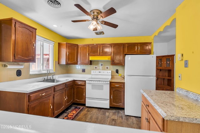 11 Lexington Dr Unit A, Whiting, NJ 08759 - kitchen with white appliances, ceiling fan, a sink, exhaust hood, and dark wood-style floors