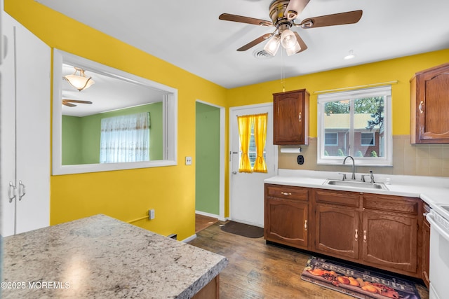 11 Lexington Dr Unit A, Whiting, NJ 08759 - kitchen with ceiling fan, dark wood-type flooring, light countertops, and a sink