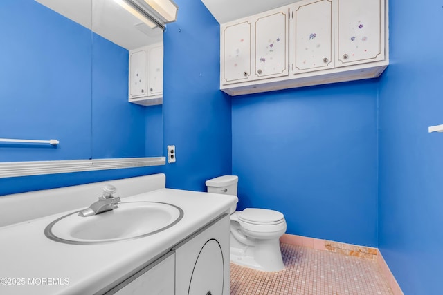 11 Lexington Dr Unit A, Whiting, NJ 08759 - half bath featuring tile patterned flooring, toilet, vanity, and baseboards