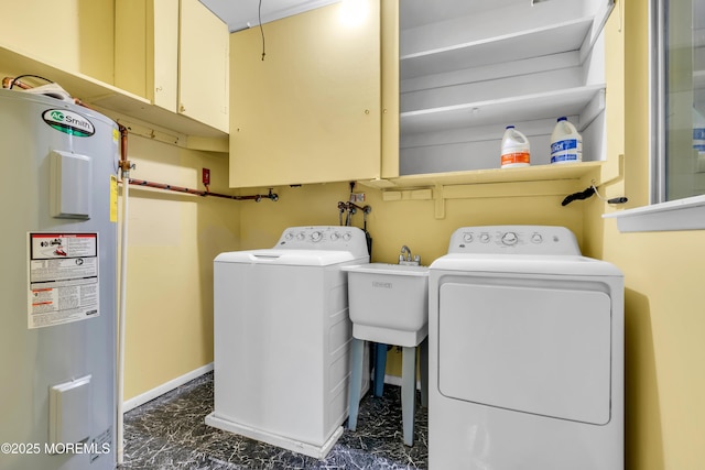 11 Lexington Dr Unit A, Whiting, NJ 08759 - laundry area featuring water heater, cabinet space, washing machine and dryer, and dark marble finish floors