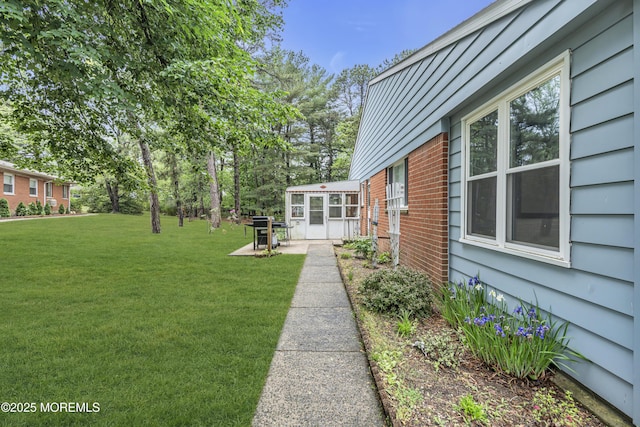 11 Lexington Dr Unit A, Whiting, NJ 08759 - view of green lawn with a patio