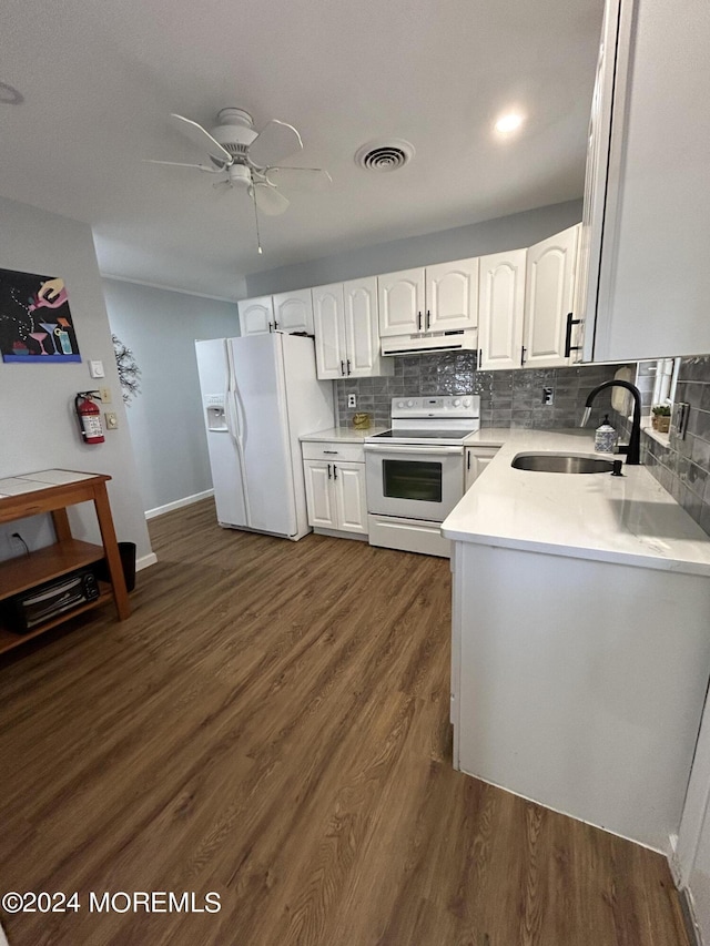 3B Hamilton Ln, Whiting, NJ 08759 - kitchen featuring white appliances, a sink, under cabinet range hood, dark wood-type flooring, and white cabinets