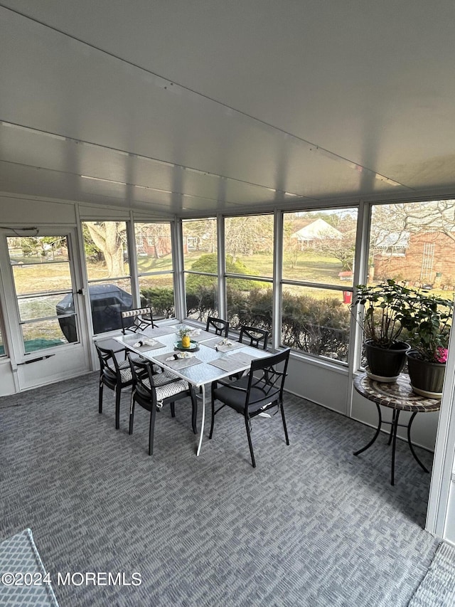 3B Hamilton Ln, Whiting, NJ 08759 - sunroom with plenty of natural light, carpet, and outdoor dining area