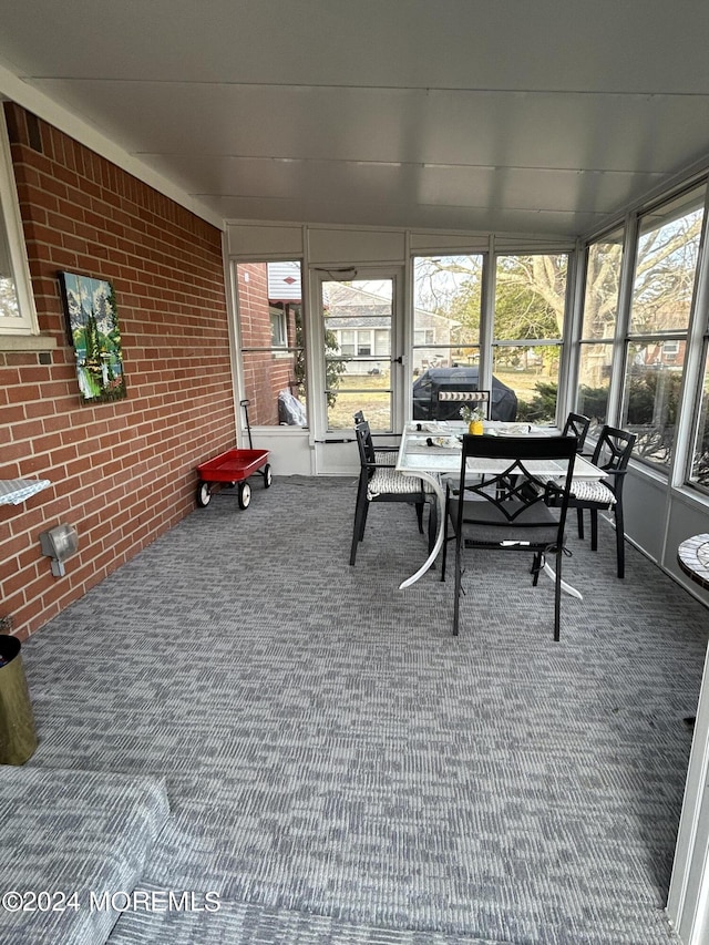 3B Hamilton Ln, Whiting, NJ 08759 - sunroom / solarium featuring brick wall and carpet flooring