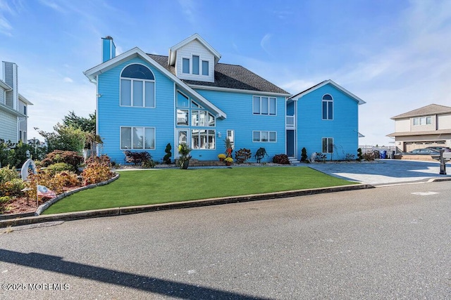 3504 Churchill Dr, Toms River, NJ 08753 - view of front of house with a chimney and a front lawn
