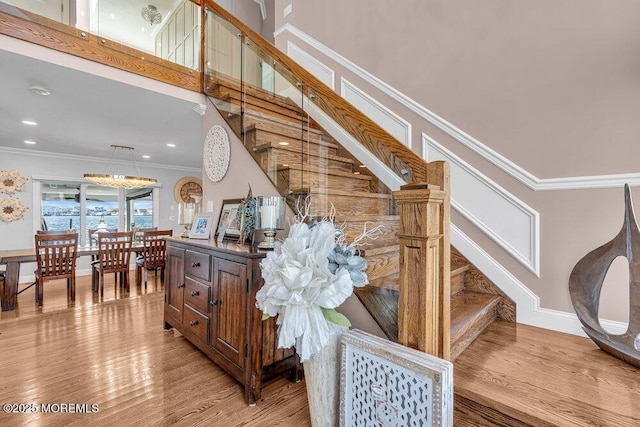 3504 Churchill Dr, Toms River, NJ 08753 - staircase with ornamental molding, wood finished floors, baseboards, and recessed lighting