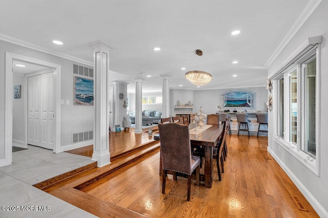 3504 Churchill Dr, Toms River, NJ 08753 - dining room featuring ornate columns, recessed lighting, crown molding, baseboards, and light wood finished floors