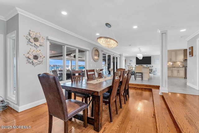 3504 Churchill Dr, Toms River, NJ 08753 - dining room with ornate columns, a chandelier, light wood-style flooring, recessed lighting, and ornamental molding