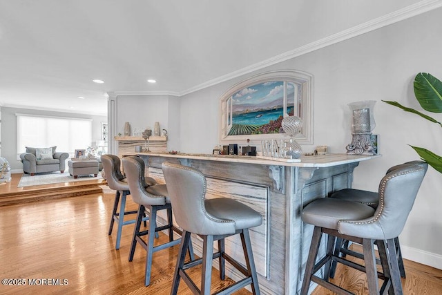 3504 Churchill Dr, Toms River, NJ 08753 - indoor dry bar with crown molding, wood finished floors, recessed lighting, and baseboards