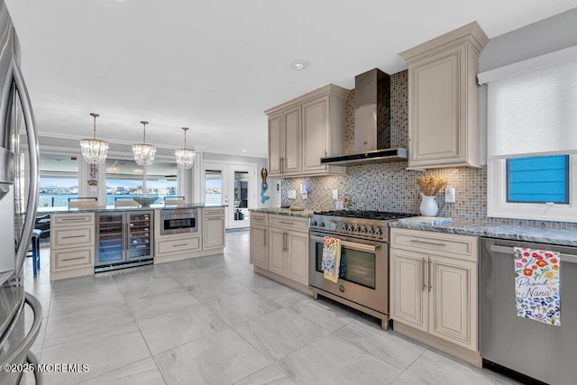 3504 Churchill Dr, Toms River, NJ 08753 - kitchen featuring stainless steel appliances, cream cabinets, beverage cooler, wall chimney range hood, and decorative backsplash