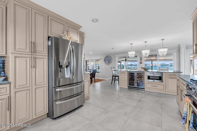 3504 Churchill Dr, Toms River, NJ 08753 - kitchen with appliances with stainless steel finishes, cream cabinets, beverage cooler, ornamental molding, and recessed lighting
