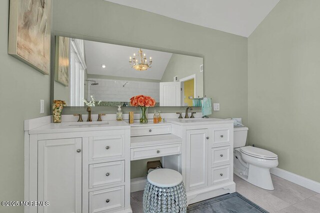 3504 Churchill Dr, Toms River, NJ 08753 - bathroom with lofted ceiling, a chandelier, toilet, double vanity, and a tile shower