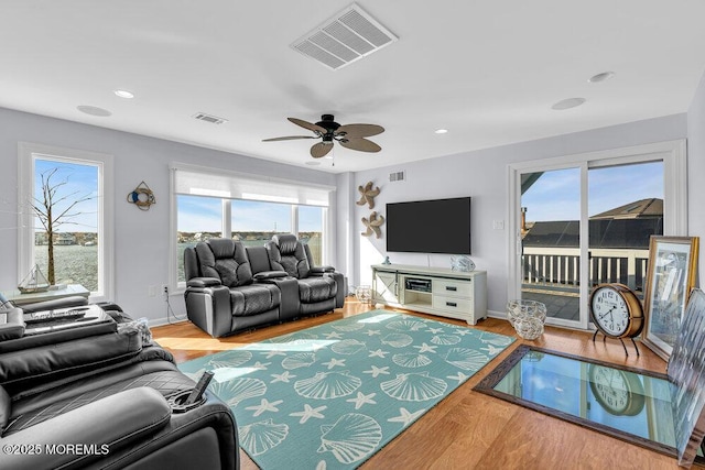 3504 Churchill Dr, Toms River, NJ 08753 - living room featuring plenty of natural light, wood finished floors, ceiling fan, and recessed lighting