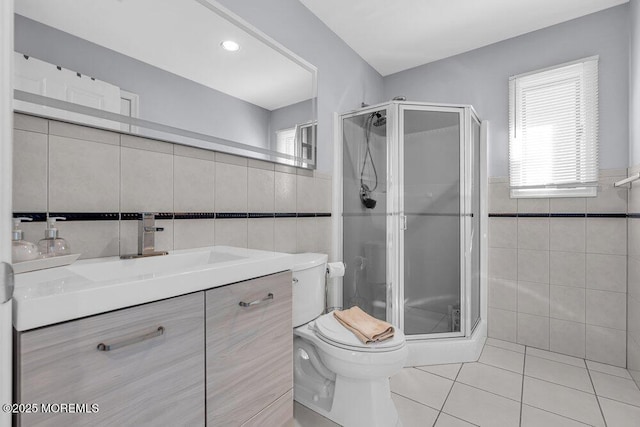 3504 Churchill Dr, Toms River, NJ 08753 - full bathroom featuring tile walls, tile patterned flooring, a shower stall, toilet, and healthy amount of natural light