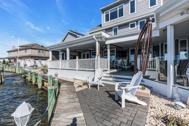 3504 Churchill Dr, Toms River, NJ 08753 - dock area with a water view and a patio