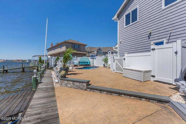 3504 Churchill Dr, Toms River, NJ 08753 - dock featuring a water view and a patio