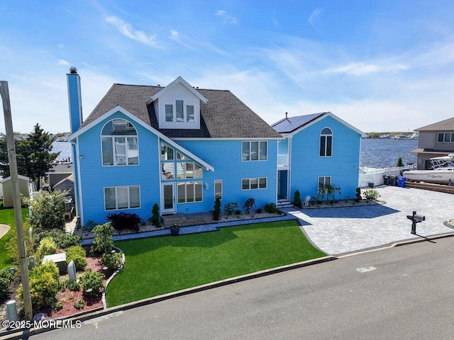 3504 Churchill Dr, Toms River, NJ 08753 - traditional-style house featuring a front yard and a chimney