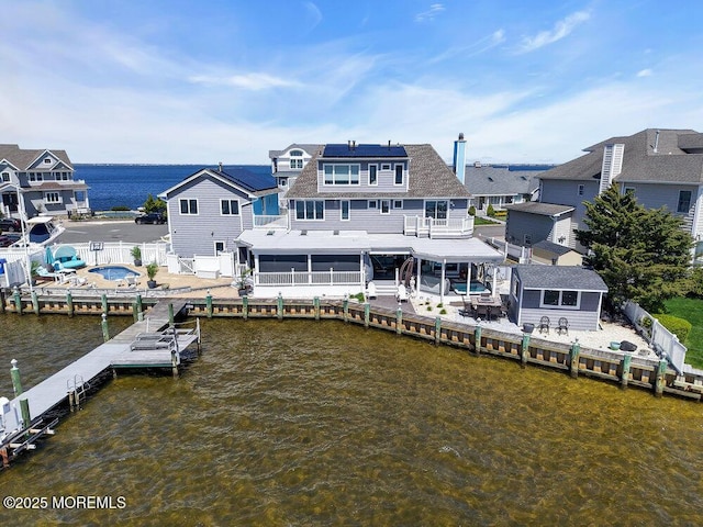 3504 Churchill Dr, Toms River, NJ 08753 - back of house with a water view, a fenced backyard, and a residential view