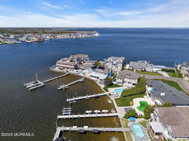 3504 Churchill Dr, Toms River, NJ 08753 - aerial view of residential area with a pool and a large body of water