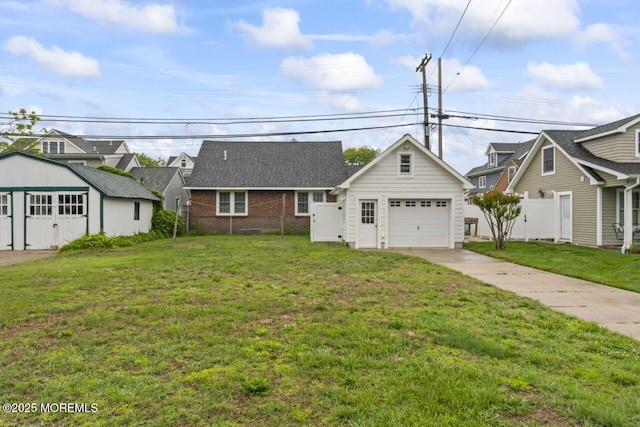 208 4th Ave, Belmar, NJ 07719 - view of front facade with driveway, an outbuilding, and brick siding