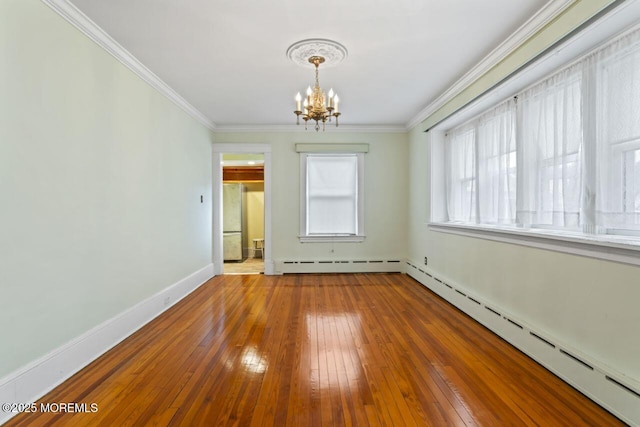 208 4th Ave, Belmar, NJ 07719 - unfurnished dining area with baseboard heating, a chandelier, hardwood / wood-style flooring, ornamental molding, and baseboards