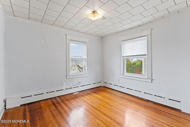 208 4th Ave, Belmar, NJ 07719 - empty room featuring hardwood / wood-style floors and baseboard heating