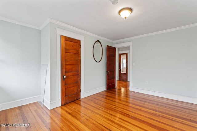 208 4th Ave, Belmar, NJ 07719 - empty room featuring baseboards, light wood-style floors, and ornamental molding